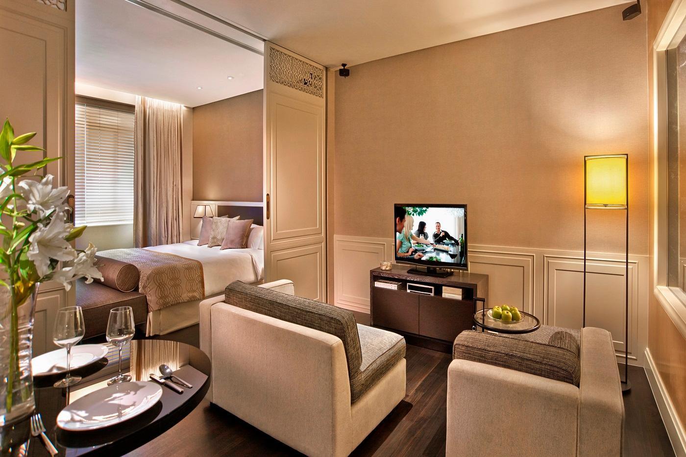 Ascott Raffles Place Szingapúr Kültér fotó A suite at The Hari