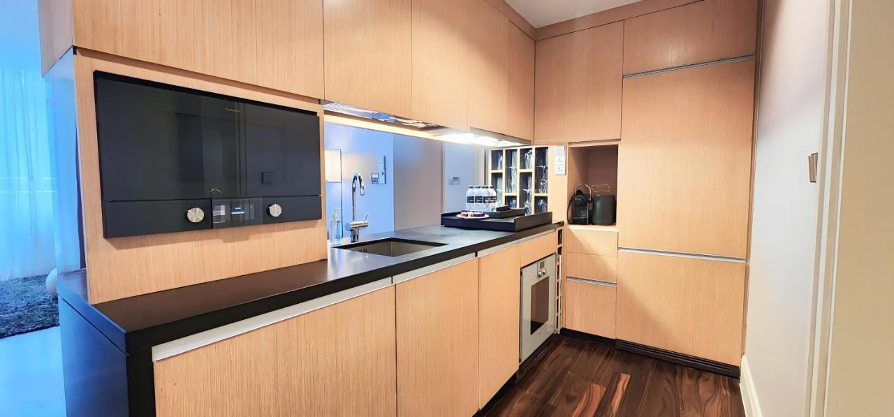 Ascott Raffles Place Szingapúr Kültér fotó A kitchen in a private home