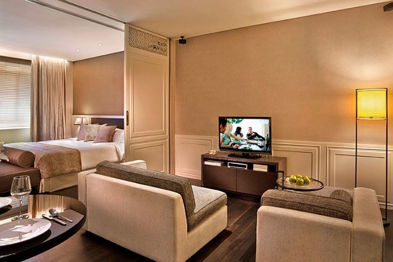 Ascott Raffles Place Szingapúr Kültér fotó A suite at the hotel
